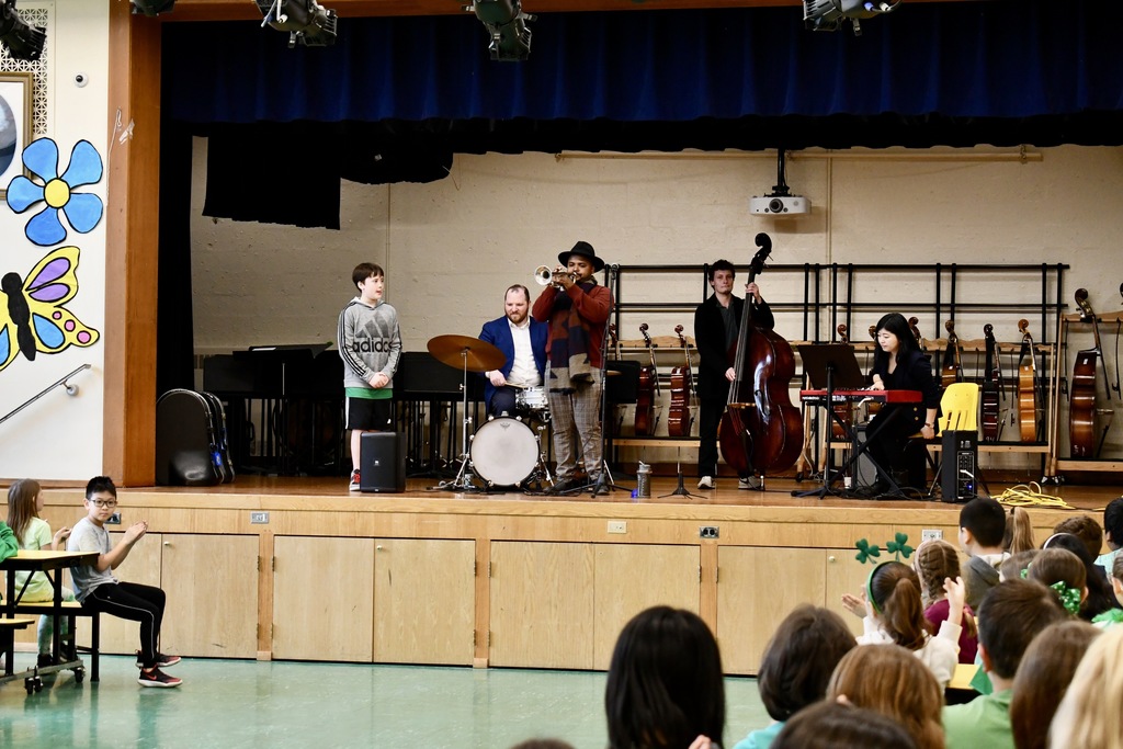 Jazz band performing for students