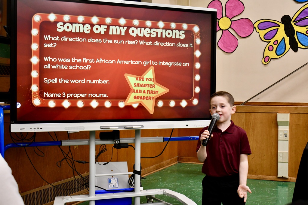 First grader presenting trivia challenge