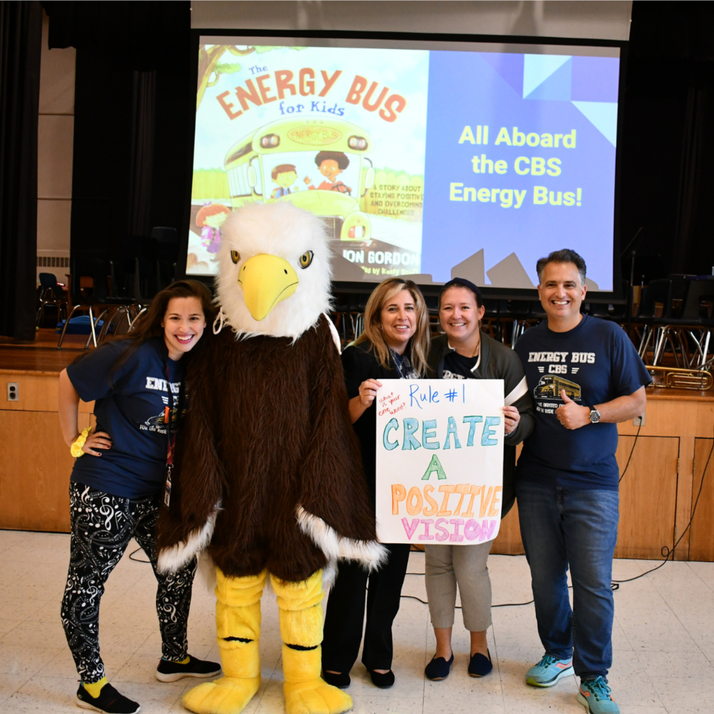 The Energy Bus committee with the eagle mascot